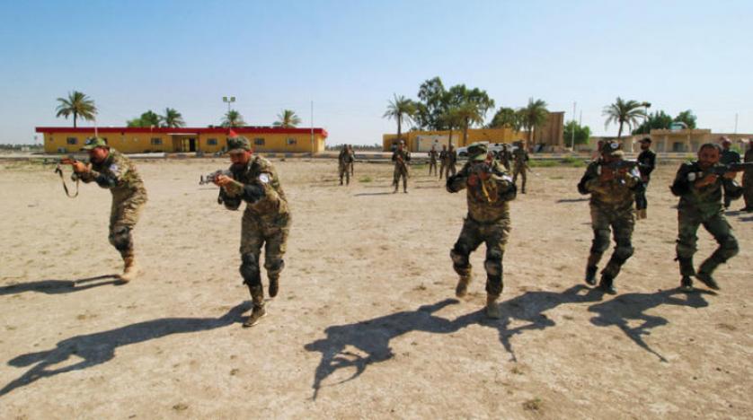  Iraqi paramilitary fighters kill two Islamic State terrorists in Anbar
