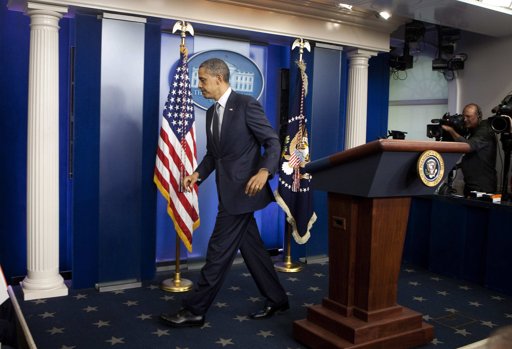  U.S. President Barack Obama walks from the podium after announcing the withdrawal of U.S. troops from Iraq by the end of the year