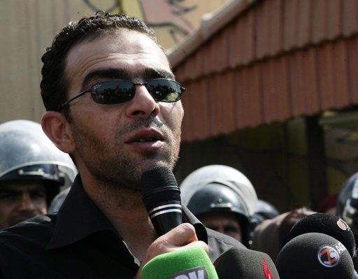  Faris Tammo speaks to the media during a protest in front of the Kurdish parliament in Irbil.