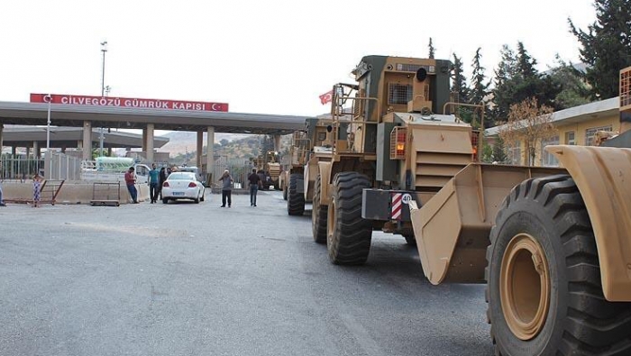  Photos: Turkish troops cross borders with Syria and station in the buffer zone