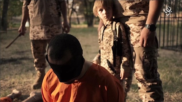  ISIS shoots and beheads spies with help of child
