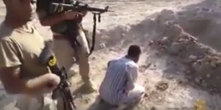  Video: Iraqi forces shoot civilian accused of belonging to Islamic State