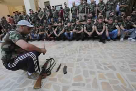  Photos: Students, university professors are training on the use of weapons