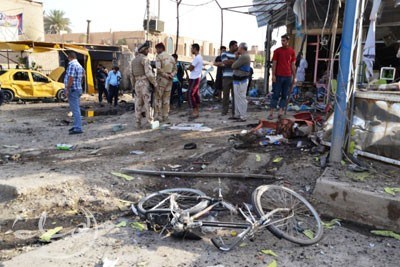  10 people killed, wounded in bomb blast near shops southwest of Baghdad