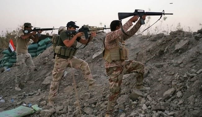  Volunteer forces free 13 policemen from ISIS capture in Tikrit