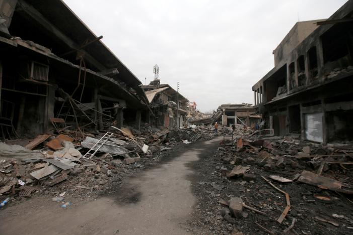  Profits of doom: Mosul mechanics swamped as bombs shatter city