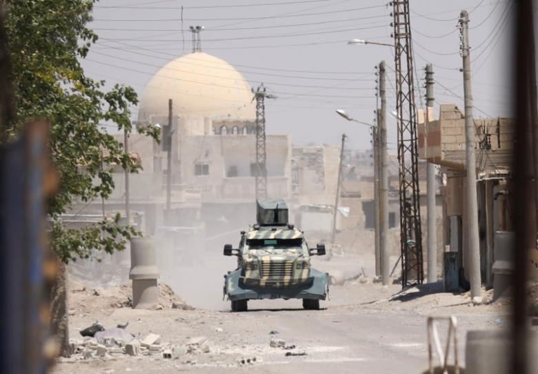  U.S.-backed Syrian forces close in on Raqqa from south