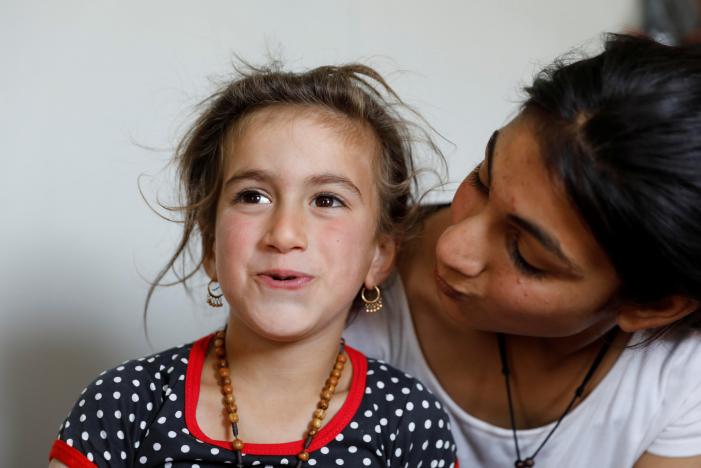 Iraqi Christian girl freed from Islamic State says ‘mum, dad’ again