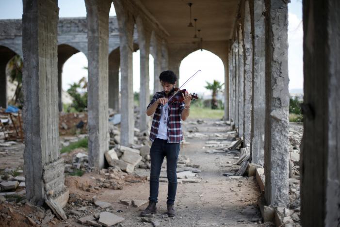  ‘We want to be happy’: Iraqi violinist plays in Mosul as troops battle IS