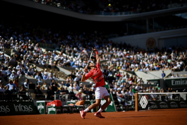  Collision course: Djokovic, Nadal roll into last 16 at French Open