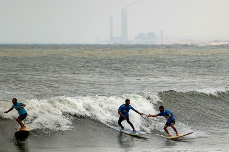  Swimming and surfing, Gazans savour a cleaner sea