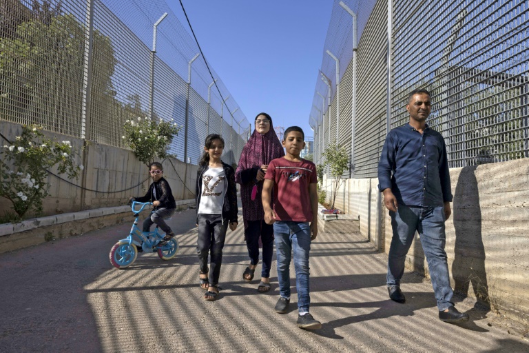  Palestinian family encircled by Israeli settlement