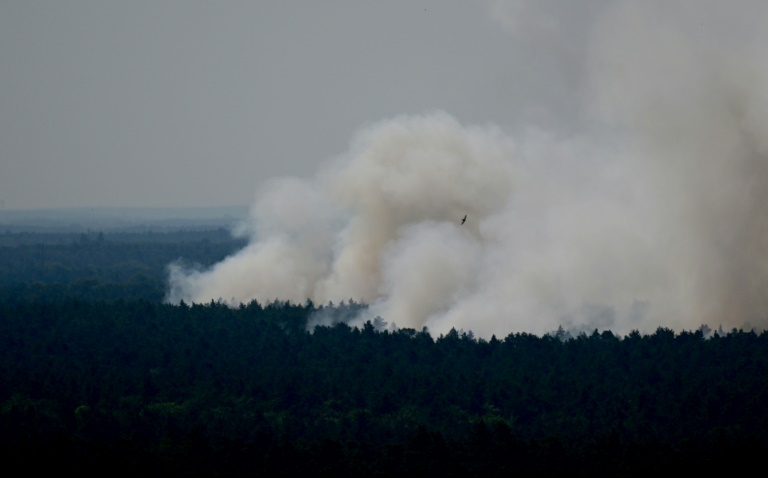  Blasts ring out as fires rage in Berlin forest