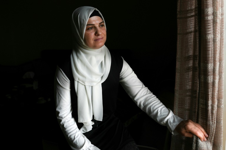  Wives, widows of Syrian detainees lead shackled life