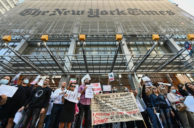  Activists protest in Manhattan for women in Iran, against the NYT