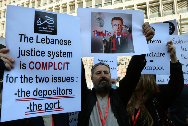  Lebanese protest central bank chief as pound hits new low