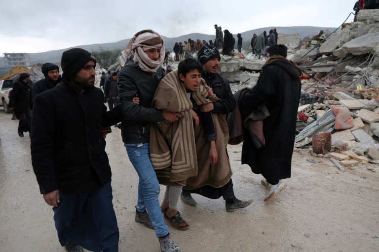  Syrian man digs for 30 relatives buried by quake