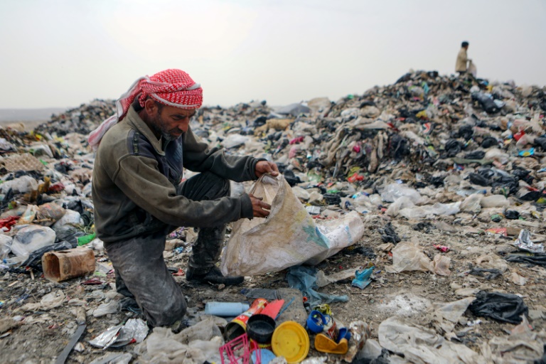  Syrians turn plastic waste into rugs to make a living