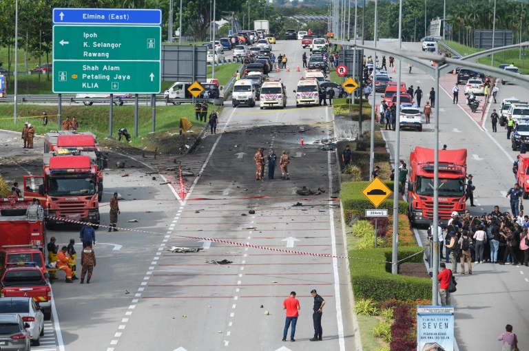  Ten killed in light plane crash on street in Malaysia