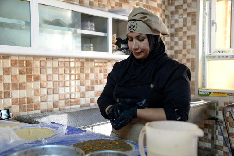 Iraq’s Mosul food business gives women independence