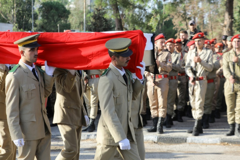  Syria buries dead after military academy drone attack