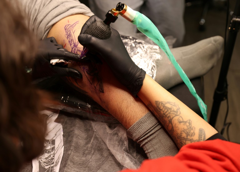  ‘Ink me up’: Iran tattoo artists aim to leave mark