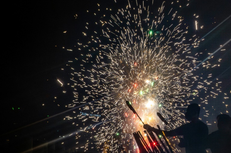  Macau’s firecracker free-for-all sparks joy for New Year celebrants