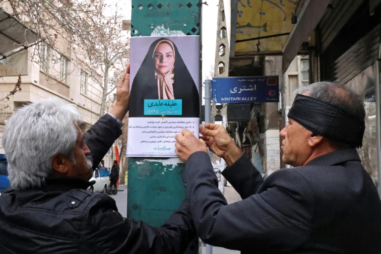 Economic pain casts dark shadow as Iranians go to vote